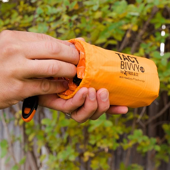 Survival Frog Tact Bivvy 2.0 Emergency Sleeping Bag with Stuff Sack, Carabiner & Survival Whistle – Compact, Lightweight, Waterproof, Reusable Thermal Bivy Sack Shelter Kit