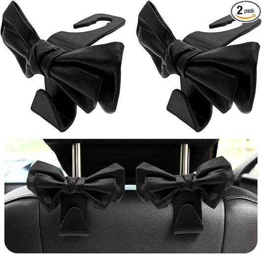 2 PCS Car Seat Headrest Hooks, Cute Bow Shaped Vehicle Backseat Storage Hooks, Leather Bow Shaped Sturdy Car Seat Back Hooks for Purses/Coats/Umbrellas, Car Accessories (Black)