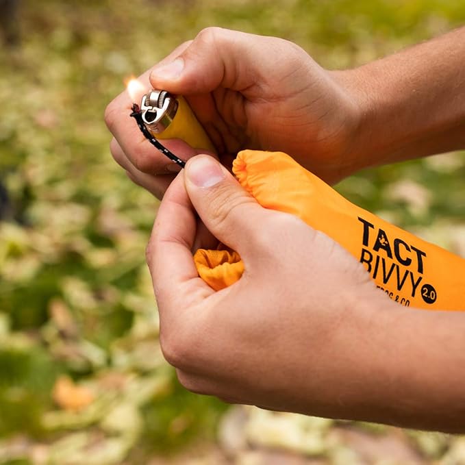 Survival Frog Tact Bivvy 2.0 Emergency Sleeping Bag with Stuff Sack, Carabiner & Survival Whistle – Compact, Lightweight, Waterproof, Reusable Thermal Bivy Sack Shelter Kit