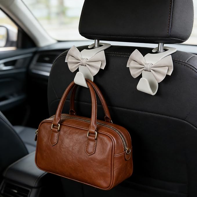 2PCS Cute Bow Car Seat Headrest Hook, Multifunctional Backseat Storage Hanger for Purse Handbag Coat, Automotive Seat Back Bag Holder Organizer, Universal for SUV RV Truck (White)