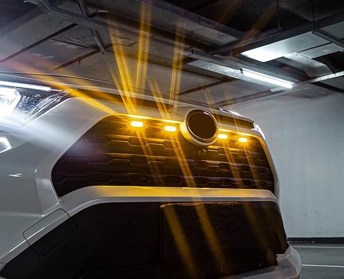iJDMTOY Smoked Lens Front Grille TRD Style Amber Yellow LED Grill Lighting Kit Compatible with Toyota 2019-2025 RAV4, Includes (4) 12-SMD Smoke Cover LED Grille Lights & Wiring Harness