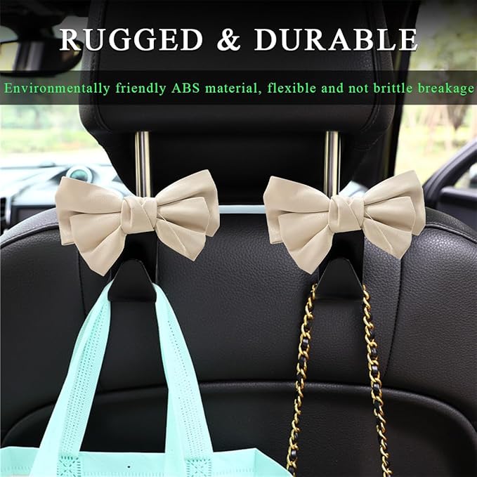 2 PCS Car Seat Headrest Hooks, Cute Bow Shaped Vehicle Backseat Storage Hooks, Leather Bow Shaped Sturdy Car Seat Back Hooks for Purses/Coats/Umbrellas, Car Accessories (Black & White)