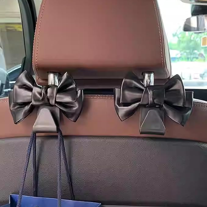 2 PCS Car Seat Headrest Hooks, Cute Bow Shaped Vehicle Backseat Storage Hooks, Leather Bow Shaped Sturdy Car Seat Back Hooks for Purses/Coats, Car Accessories (Black)