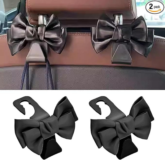2 PCS Car Seat Headrest Hooks, Cute Bow Shaped Vehicle Backseat Storage Hooks, Leather Bow Shaped Sturdy Car Seat Back Hooks for Purses/Coats, Car Accessories (Black)