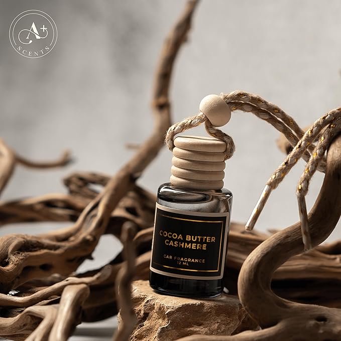 COCOA BUTTER CASHMERE - A warm, intriguing fragrance that combines sweet cocoa butter and coconut. - Lasts up to 60 days - Luxury Car Perfume A+ Scents Car Hanging Diffuser